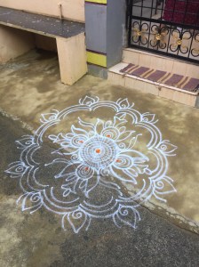 Mandela people draw outside their front door for good luck